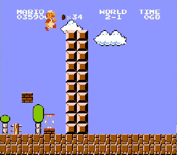 Mario must use the spring to clear the wall at the end of the level