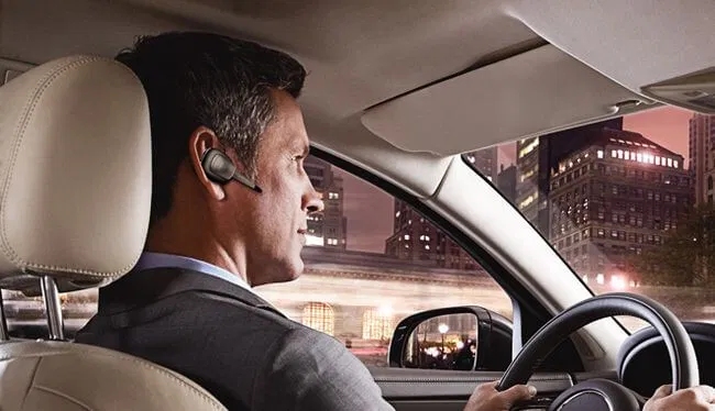 A Bluetooth headset allows hands-free use of a mobile phone whilst driving