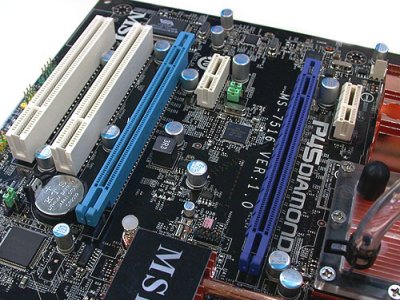 This motherboard features two 16x and two 1x PCI-E slots, and two PCI slots (far left)